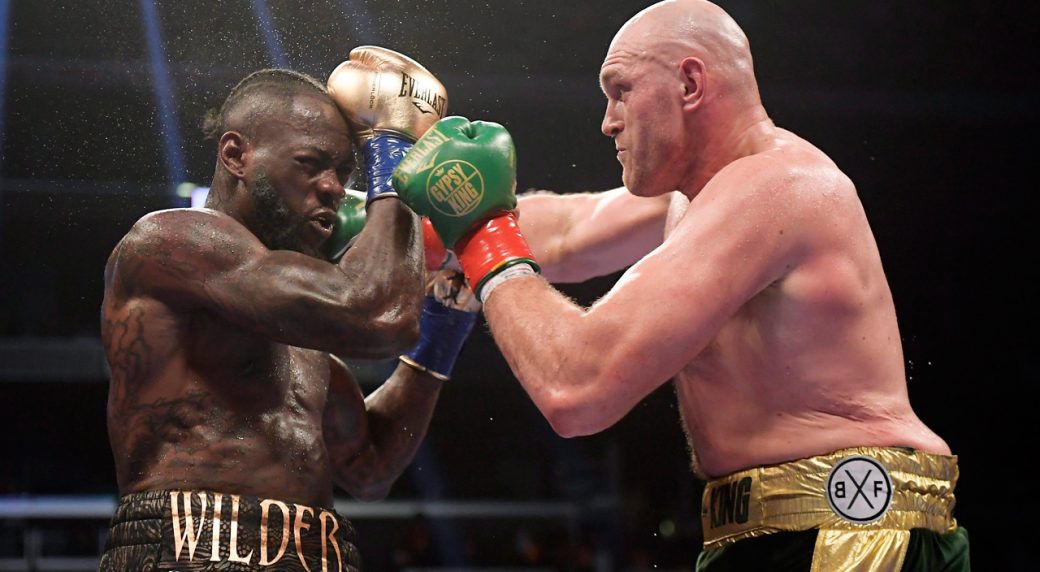 deontay-wilder-tyson-fury-trade-punches-1040×572